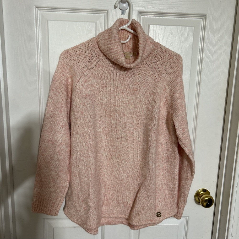 Pale pink Michael Kors sweater.